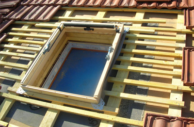 Pose et réparation de velux 75